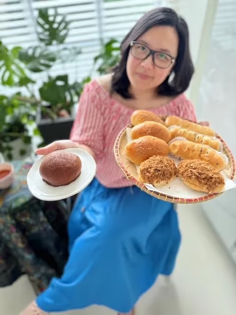 Mary holding her freshly baked Indonesian roti