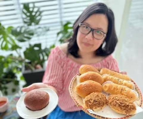 Mary holding her freshly baked Indonesian roti